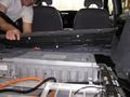 Removing carpeting from top of OEM battery.jpg
