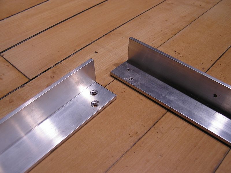 File:Holes drilled in aluminum.JPG